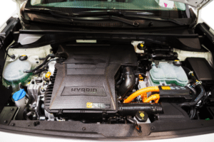 Spring Hybrid Service in Merriam, KS At Done With Care Auto Repair. Image of Hybrid vehicle with hood open showing engine