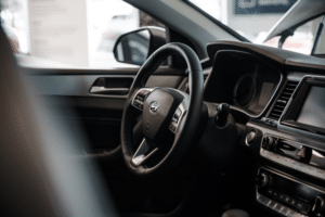 Hyundai Maintenance and Kia Maintenance in Merriam KS At Done With Care Auto Repair. Close-up of Hyundai dashboard and steering wheel inside vehicle