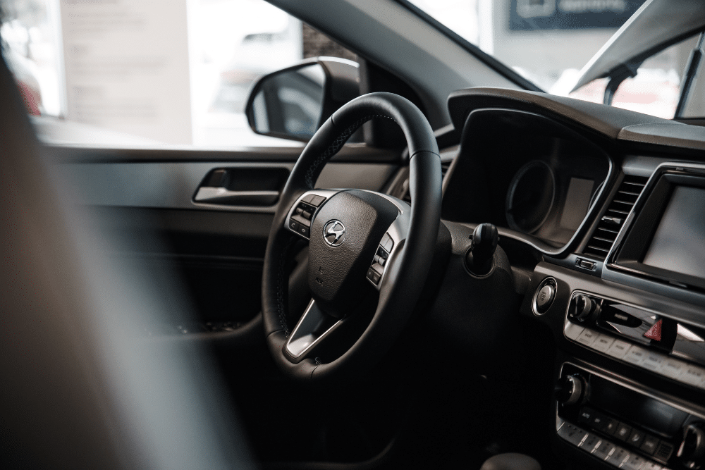 Hyundai Maintenance and Kia Maintenance in Merriam KS At Done With Care Auto Repair. Close-up of Hyundai dashboard and steering wheel inside vehicle